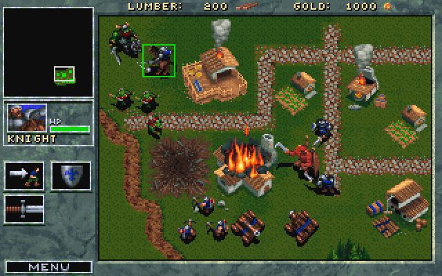 WarCraft: Orcs & Humans Screenshot (Blizzard Entertainment website, 1997): A daemon wreaks havoc on a small town while the Human defenders try to hold back an attack.