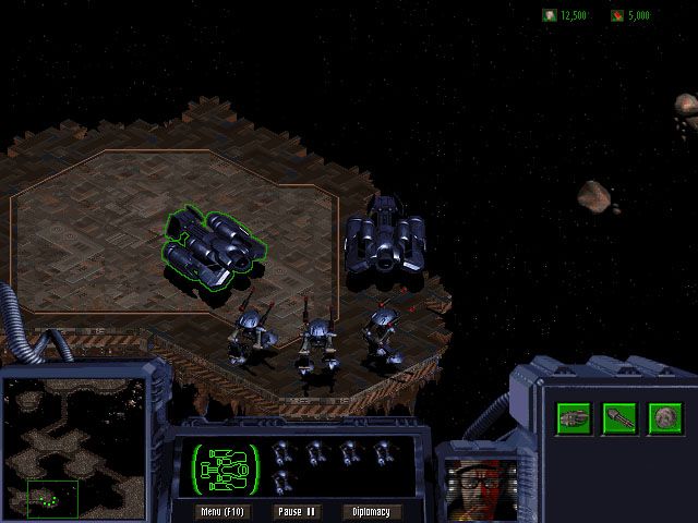 StarCraft Screenshot (Blizzard Entertainment website, 1996): A Goliath strike team of waits to be loaded onto a transport.
