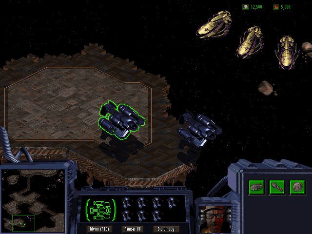 StarCraft Screenshot (Blizzard Entertainment website, 1996): A trio of Protoss carriers arrives as the last Goliath is loaded.