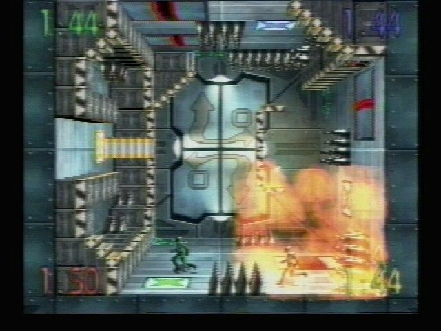 Blast Chamber Screenshot (Activision E3 1996 Press Kit): Players run from an explosion caused by an opponent who fell onto lethal spikes.