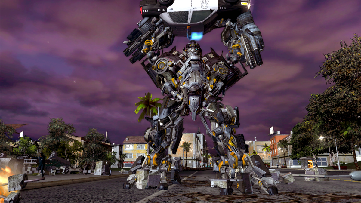 Transformers: The Game Screenshot (Transformers: The Game Press Kit): Ironhide Car Toss Xbox 360
