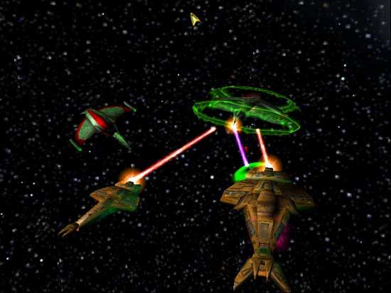 Star Trek: Armada Screenshot (Assorted material): A Warbird uses it's Shield Inversion Beam to defend against two Cardassian ships. 10 February 2000