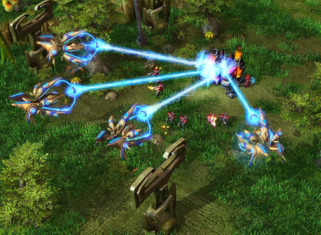 StarCraft II: Wings of Liberty Screenshot (Official website - Features - Protoss Units (2007-07-09)): Warp rays assault a Terran Barracks