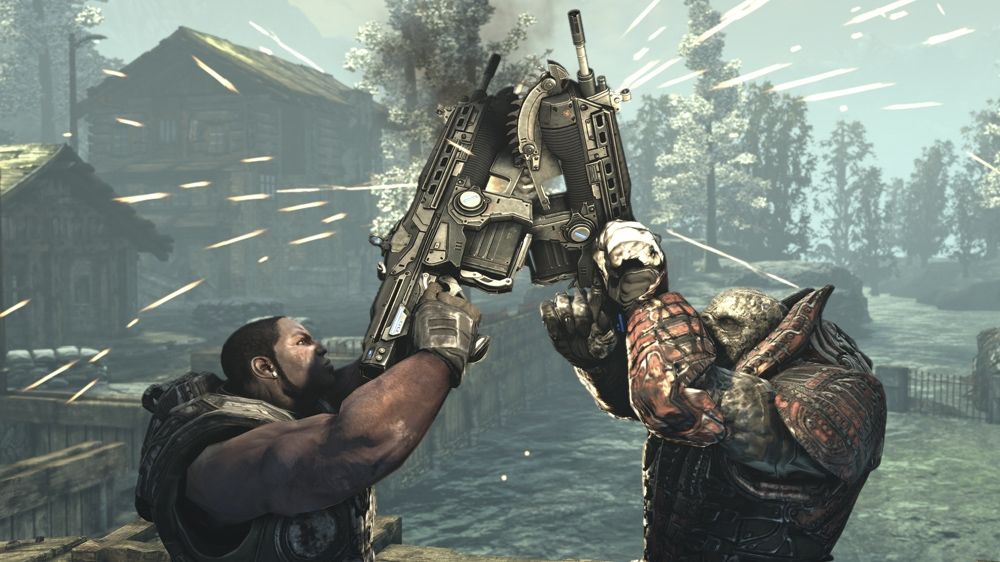 Gears of War 2 Screenshot (Xbox.com product page): A chainsaw duel