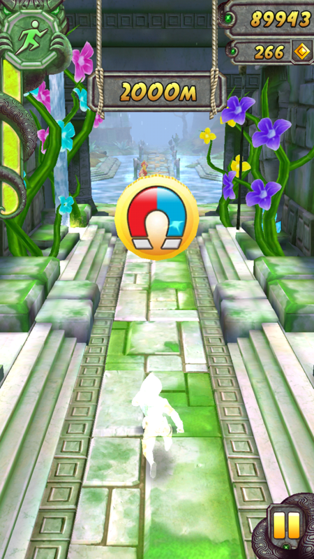 Temple Run 2 (Android) screenshot: A super-speed power-up executed with the coin magnet shown.