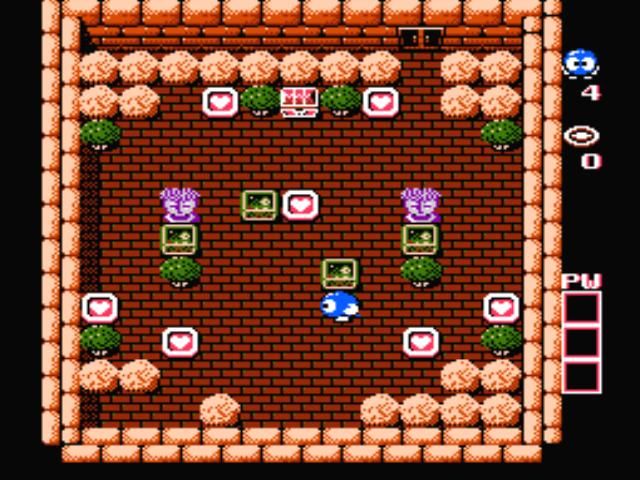 Adventures of Lolo (NES) screenshot: Those violet creatures look pretty suspicious