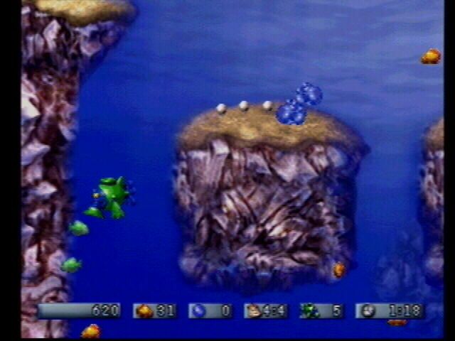 The Amazing Virtual Sea-Monkeys (PlayStation) screenshot: Green fish you don't want to eat.