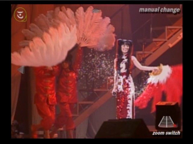 Visual Mix: Ayumi Hamasaki Dome Tour 2001 (PlayStation 2) screenshot: There are several different trace effects, notice how her movement of a hand left a sparkling trace