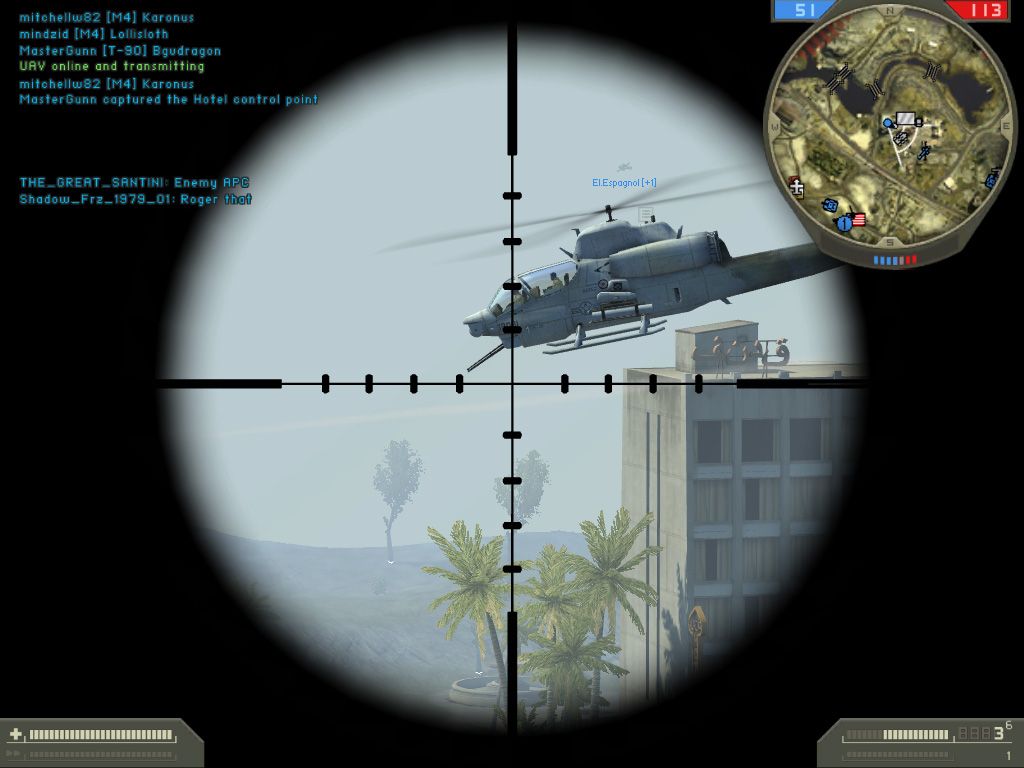Battlefield 2 (Windows) screenshot: Trying to get a shot through their window.