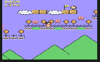 Terry's Big Adventure (Commodore 64) screenshot: These green areas are trampolines for these little stars to play on