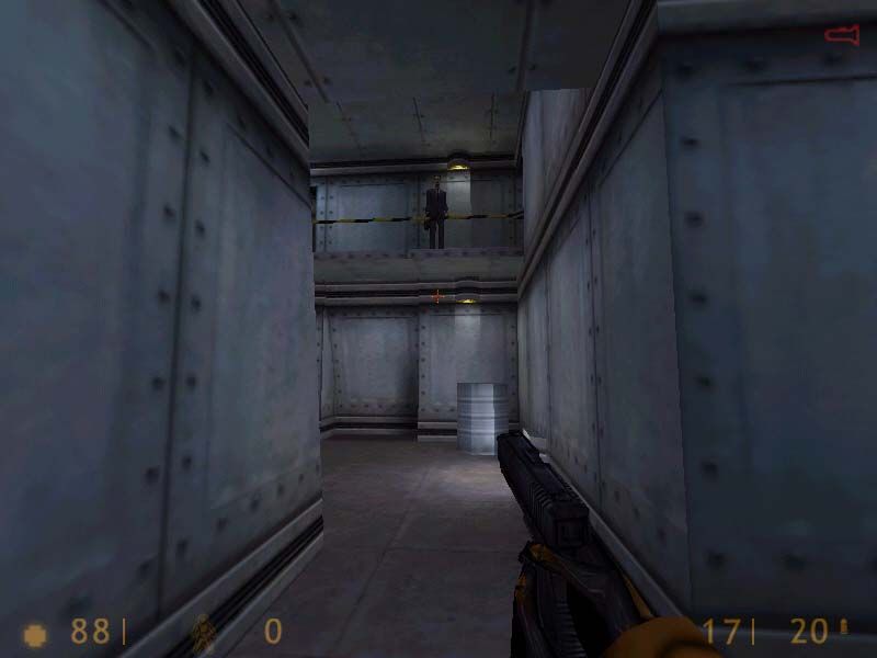 Half-Life (Windows) screenshot: The mysterious, elusive G-Man appears in various spots