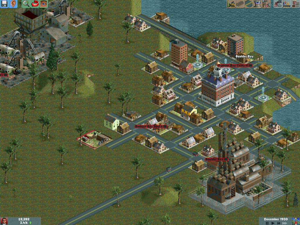 Chris Sawyer's Locomotion (Windows) screenshot: Here is a zoomed in view of the town. Note that graphics change greatly when increasing the resolution