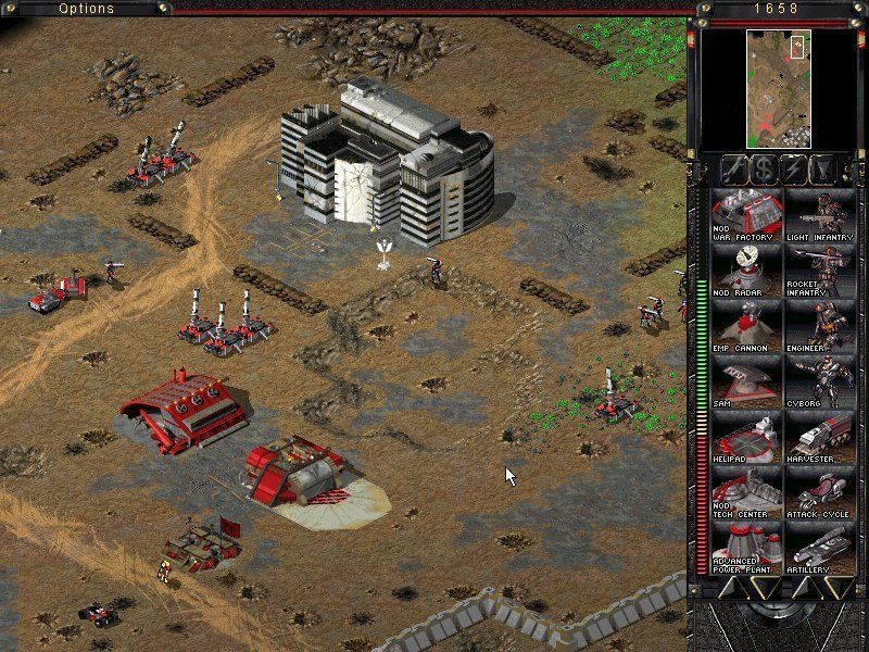 Command & Conquer: Tiberian Sun (Windows) screenshot: Nod artillery leveling down the civilian hospital.