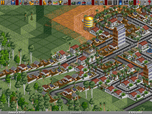 Transport Tycoon Deluxe (Windows) screenshot: Small rich town on a desert/tropical map.
