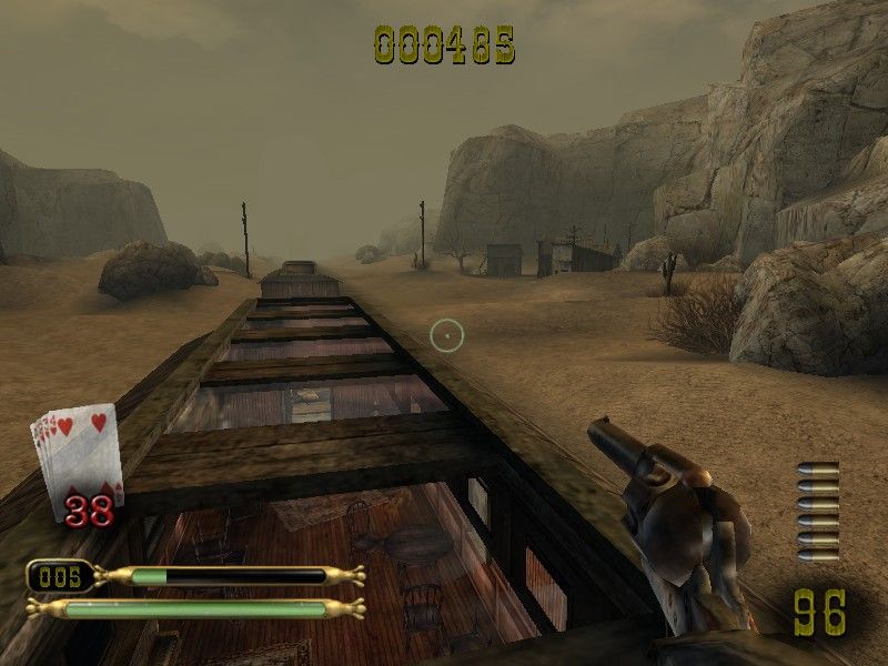 Dead Man's Hand (Windows) screenshot: It's a western, there has to be a train top battle.