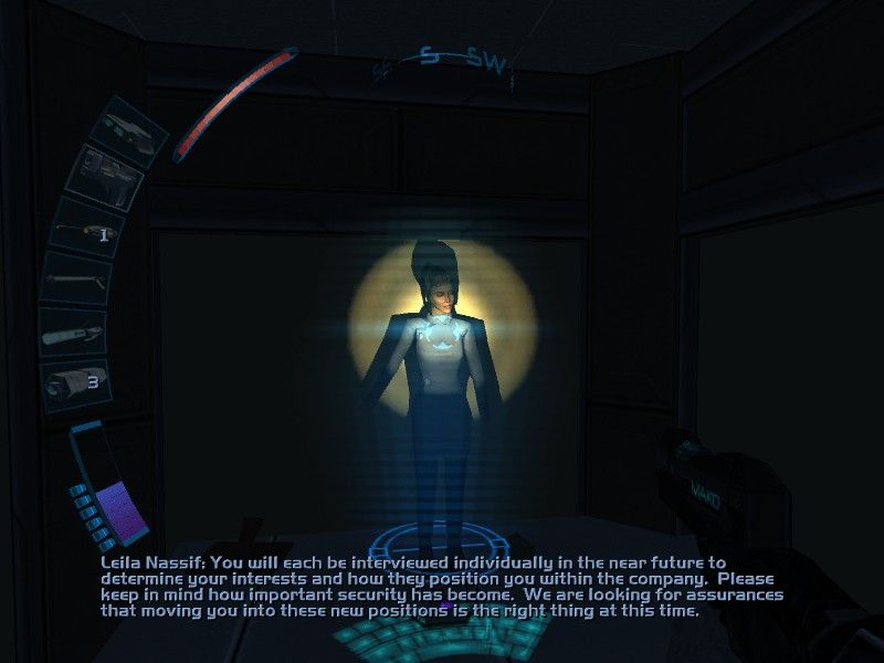 Deus Ex: Invisible War (Windows) screenshot: You may find yourself listening to holographs as much as with NPCs (the light circle is from the gun you're holding, helps you see your target better since all is so dark)