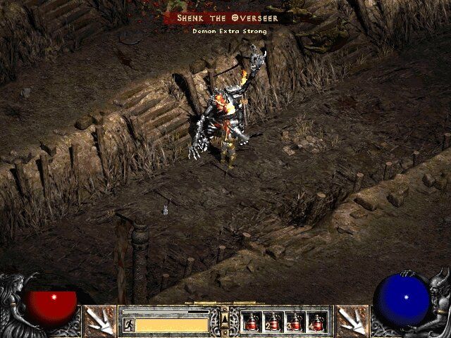 Diablo II: Lord of Destruction (Windows) screenshot: Demon-a-womano fight against the general of siege bestiaries.