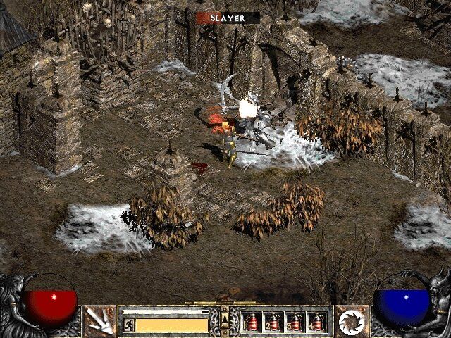 Diablo II: Lord of Destruction (Windows) screenshot: Battling monsters near the ruins of destroyed castles and fortifications.