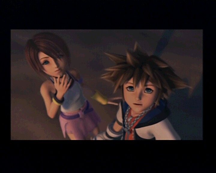 Kingdom Hearts (PlayStation 2) screenshot: Sora and Kairi from the opening FMV. Aside from intro and outro, all other movies are using ingame graphic.