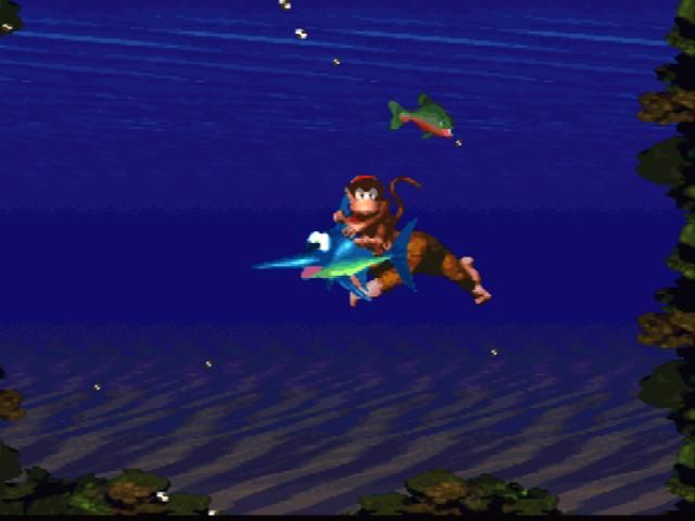 Donkey Kong Country (SNES) screenshot: Riding this fish is much better than swimming alone