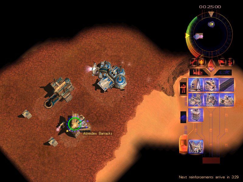 Emperor: Battle for Dune (Windows) screenshot: You can always zoom out your battlefield if you wanna see more units and have better control over the wild bunch. Though it slows the game on computers such as mine at the moment :(