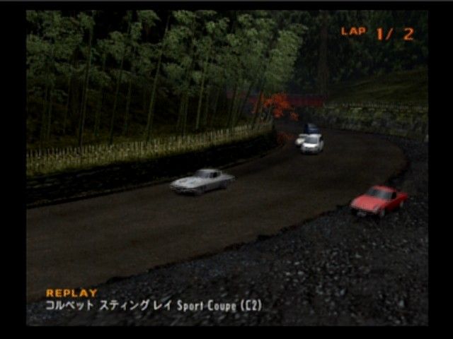 Enthusia: Professional Racing (PlayStation 2) screenshot: Ability to turn and brake varies with the terrain, so if you exit the track on the grass, mud, sand, or pebbles, you're in for a crash