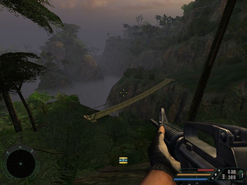 Far Cry (Windows) screenshot: Early morning fog still lingering in the valley below.