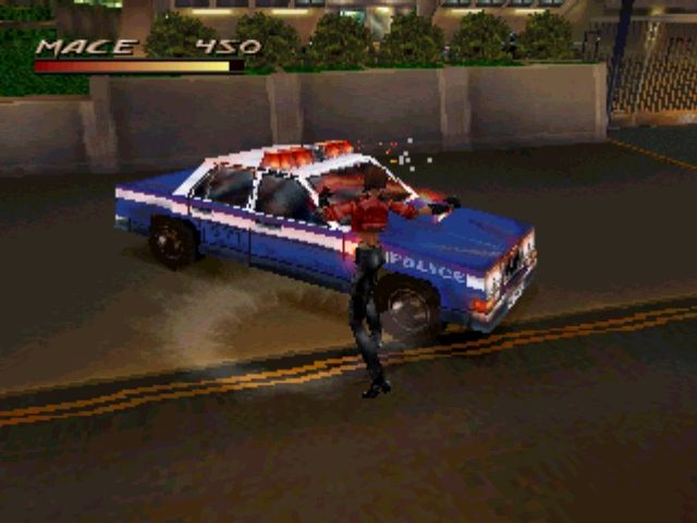 Fighting Force (PlayStation) screenshot: Take that, cop car! Although a good guy, you can pretty much beat on everything, including this poor squad car.