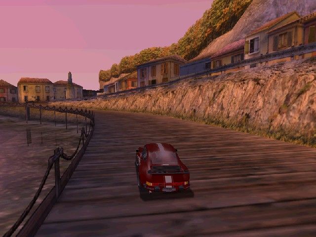 Need for Speed: Porsche Unleashed (Windows) screenshot: Taking the low road (the slightly-longer route is on the cliff above).