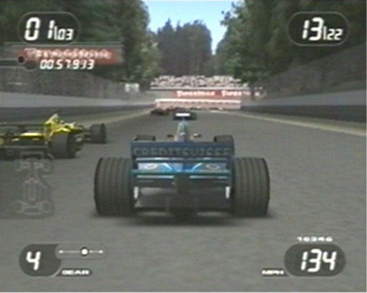 Formula One 2001 (PlayStation 2) screenshot: "There's Kimi passing a Jordan!"
