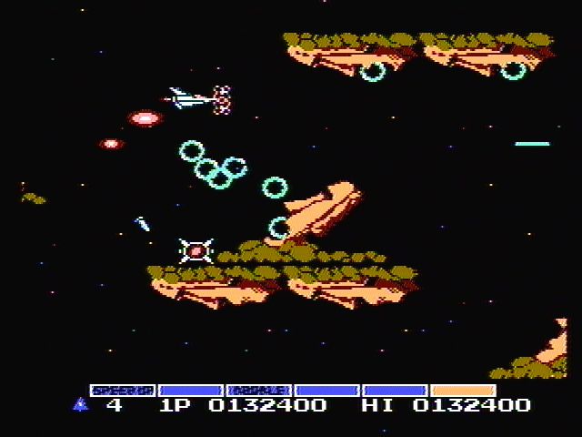 Gradius (NES) screenshot: Watch out for giant stone heads!