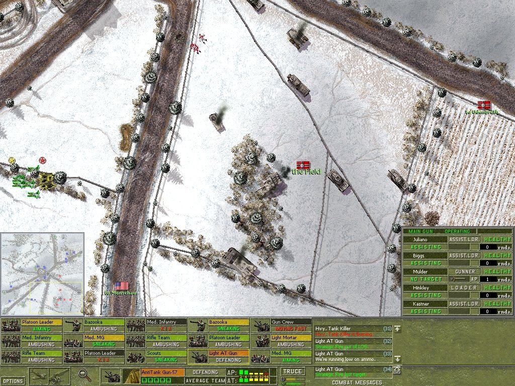 Close Combat: The Battle of the Bulge (Windows) screenshot: This shows the humongous JagdTiger (burning!), and many other German tanks & vehicles