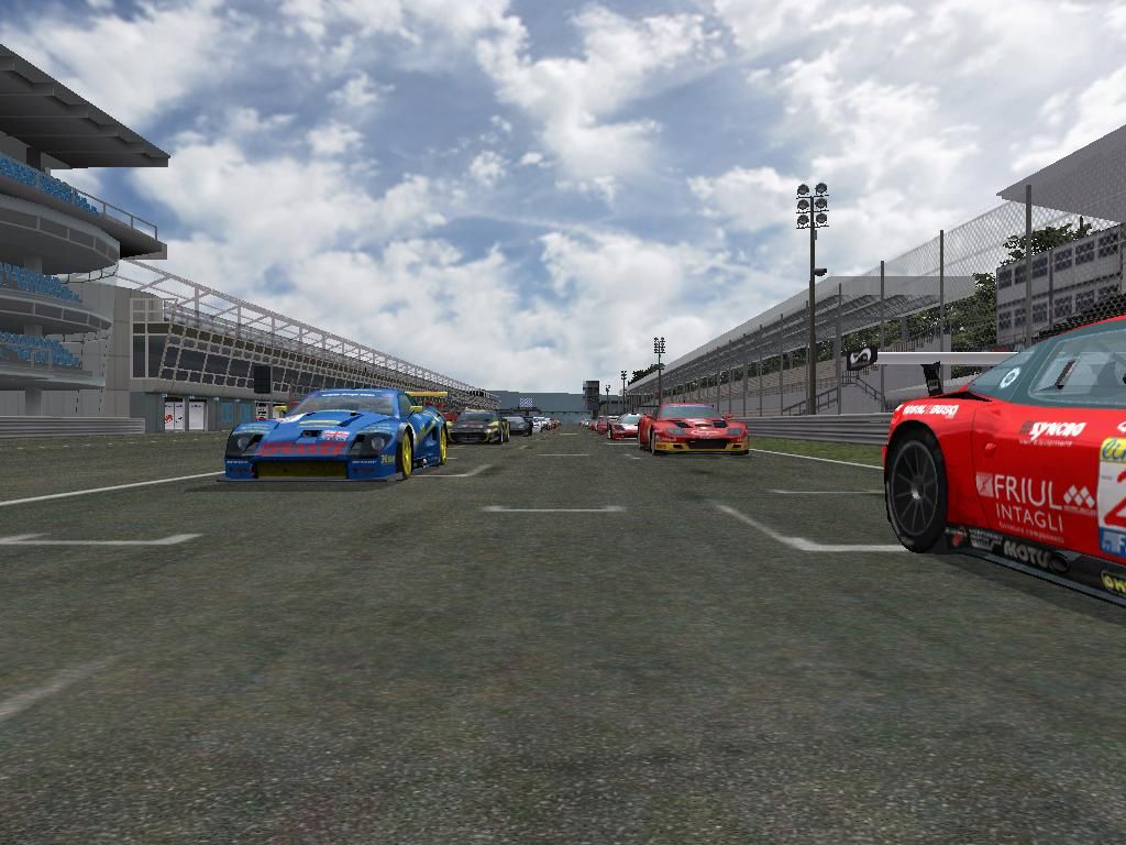 GTR: FIA GT Racing Game (Windows) screenshot: Cars on the grid and ready to go