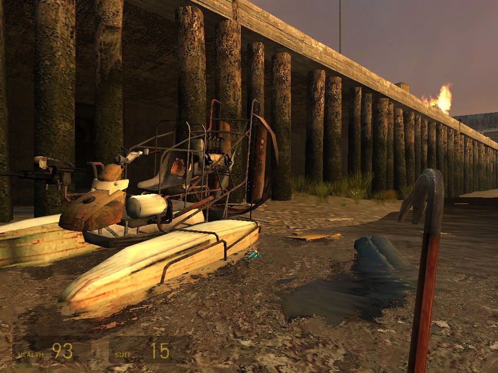 Half-Life 2 (Windows) screenshot: You often need to leave your bike to open the gates to the next section.