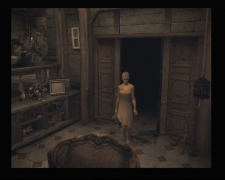 Haunting Ground (PlayStation 2) screenshot: Maybe I should check this tv set... assuming it still works