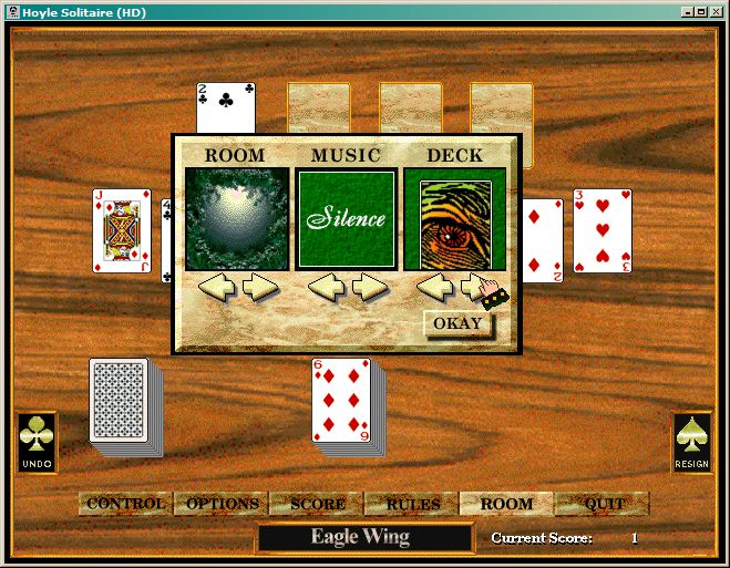 Hoyle Solitaire (Windows) screenshot: Eagle Wing & the pop-up Rooms window for changing backgrounds and card backs