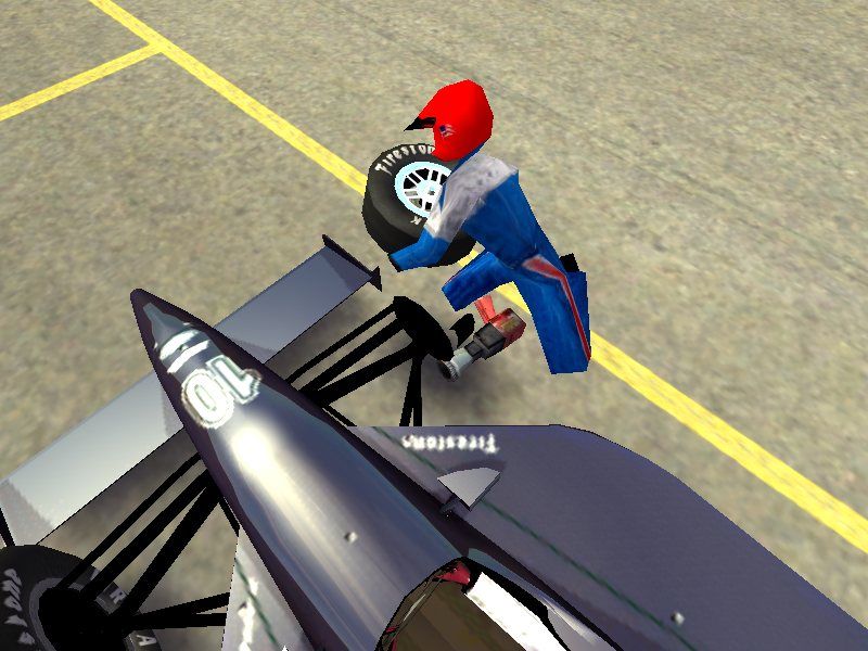 IndyCar Series (Windows) screenshot: Only one man to change tire