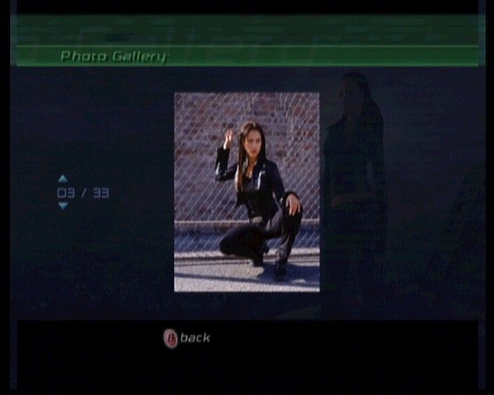 James Cameron's Dark Angel (Xbox) screenshot: Among extras, there is a photo gallery of Max (Jessica Alba).