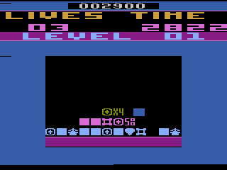 Pick 'n Pile (Atari 2600) screenshot: Trying to create columns of matching symbols