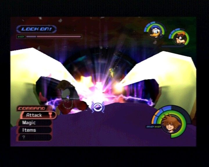 Kingdom Hearts (PlayStation 2) screenshot: Fighting against one of the biggest, but not meanest, bosses. Locking him for a clear hit while on top of him.