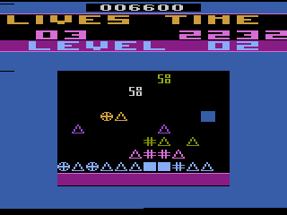 Pick 'n Pile (Atari 2600) screenshot: Each level features a variety of different symbols; beginning level two here