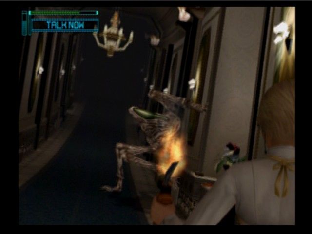 Lifeline (PlayStation 2) screenshot: Looks like this spider creature is weak only to fire, and to throw this molotov cocktail into his mouth requires good timing