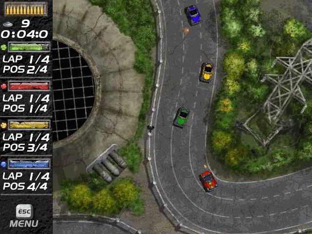 Mad Cars (Windows) screenshot: Racing on a curving track around a nuclear power plant