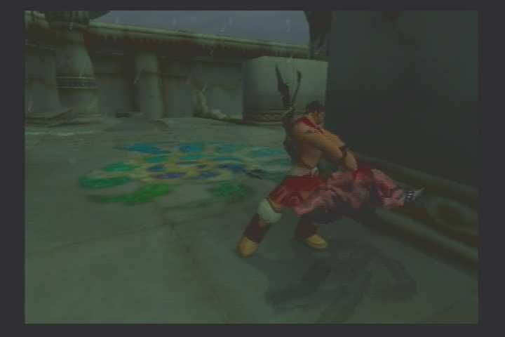 The Mark of Kri (PlayStation 2) screenshot: Stealth killing an enemy by slamming their head into a wall