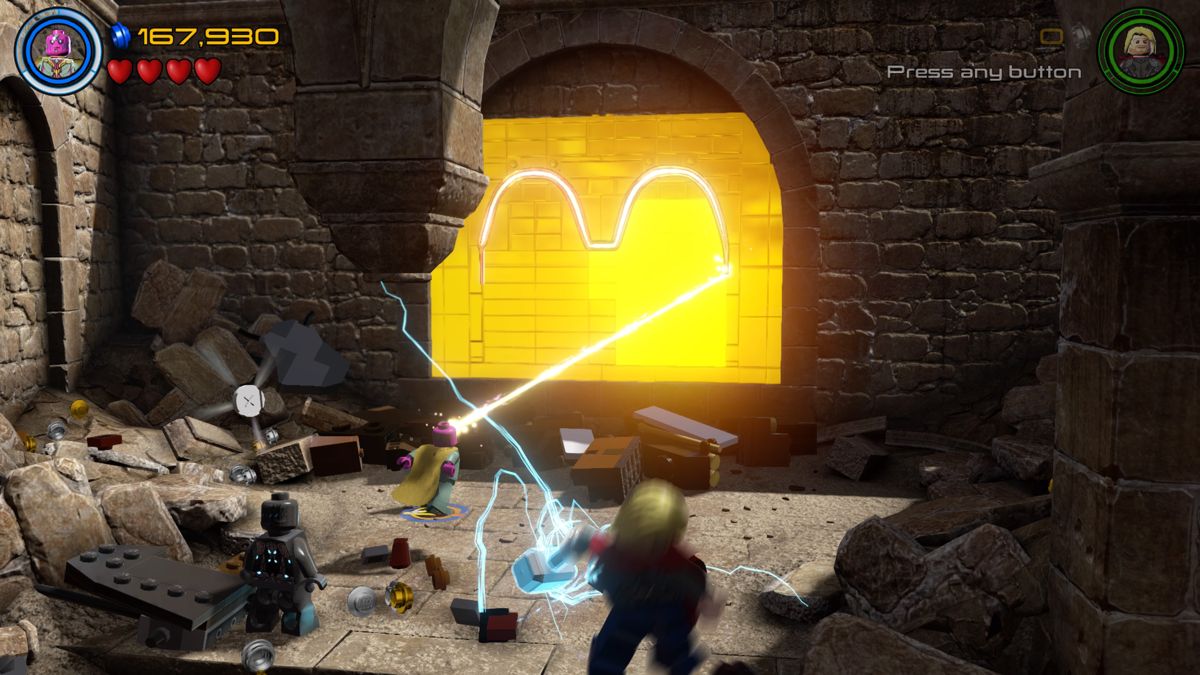LEGO Marvel Avengers (PlayStation 4) screenshot: Vision using the power of his soul crystal to cut through golden objects