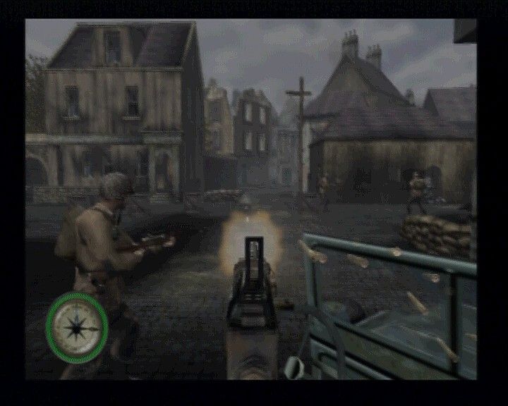 Medal of Honor: Frontline (PlayStation 2) screenshot: Using machine gun mounted on a jeep to help your fellow soldiers.