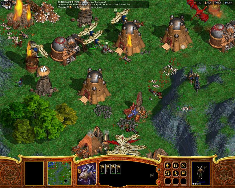 Warlords: Battlecry II (Windows) screenshot: Griffons and Dragons attacking a Dwarf base