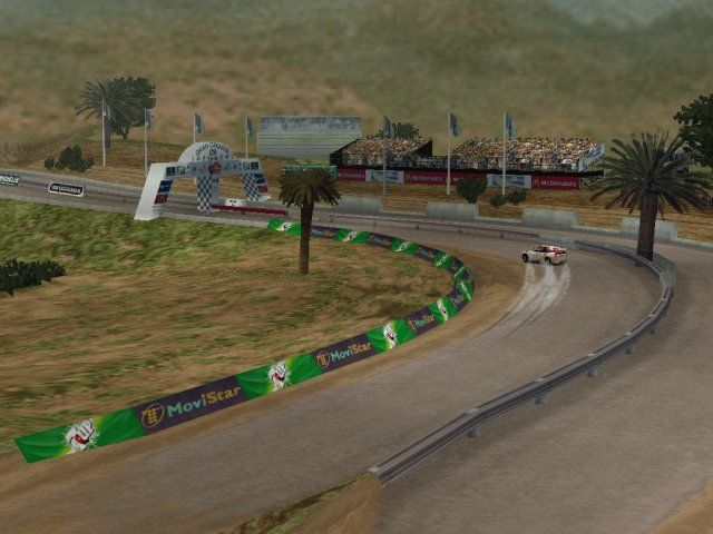 Michelin Rally Masters: Race of Champions (Windows) screenshot: Toyota Corolla WRC sliding through the turn in Canary Islands