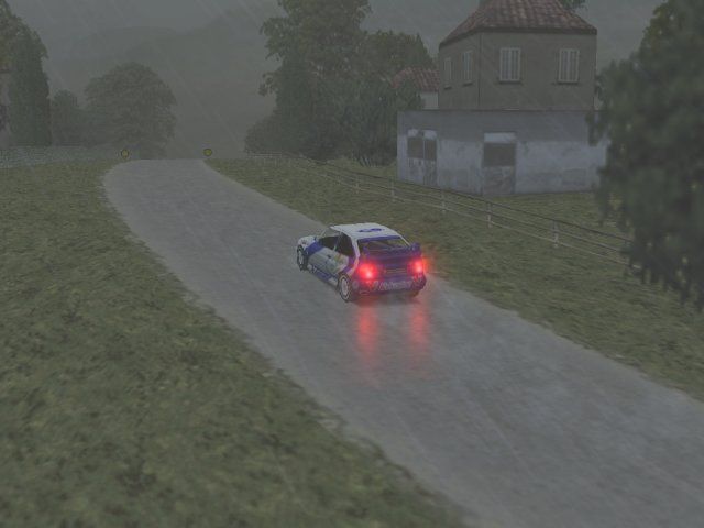 Michelin Rally Masters: Race of Champions (Windows) screenshot: Ford Escort WRC in the rain