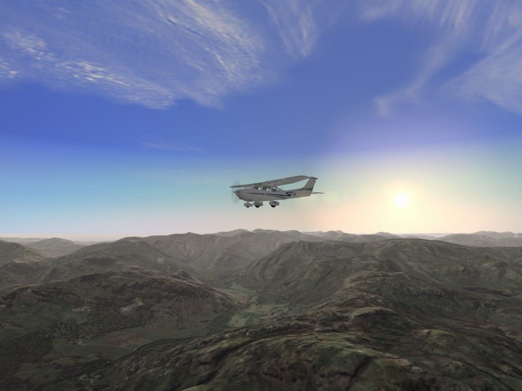 Microsoft Flight Simulator 2004: A Century of Flight (Windows) screenshot: Lake District UK, with VFR Photo Scenery and VFR Terrain add-ons.